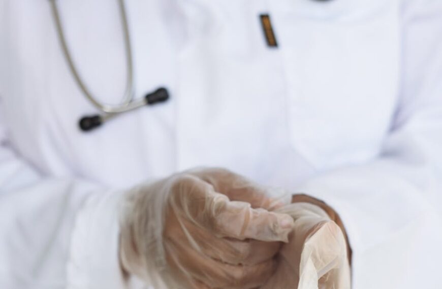 crop doctor with stethoscope preparing for surgery in hospital