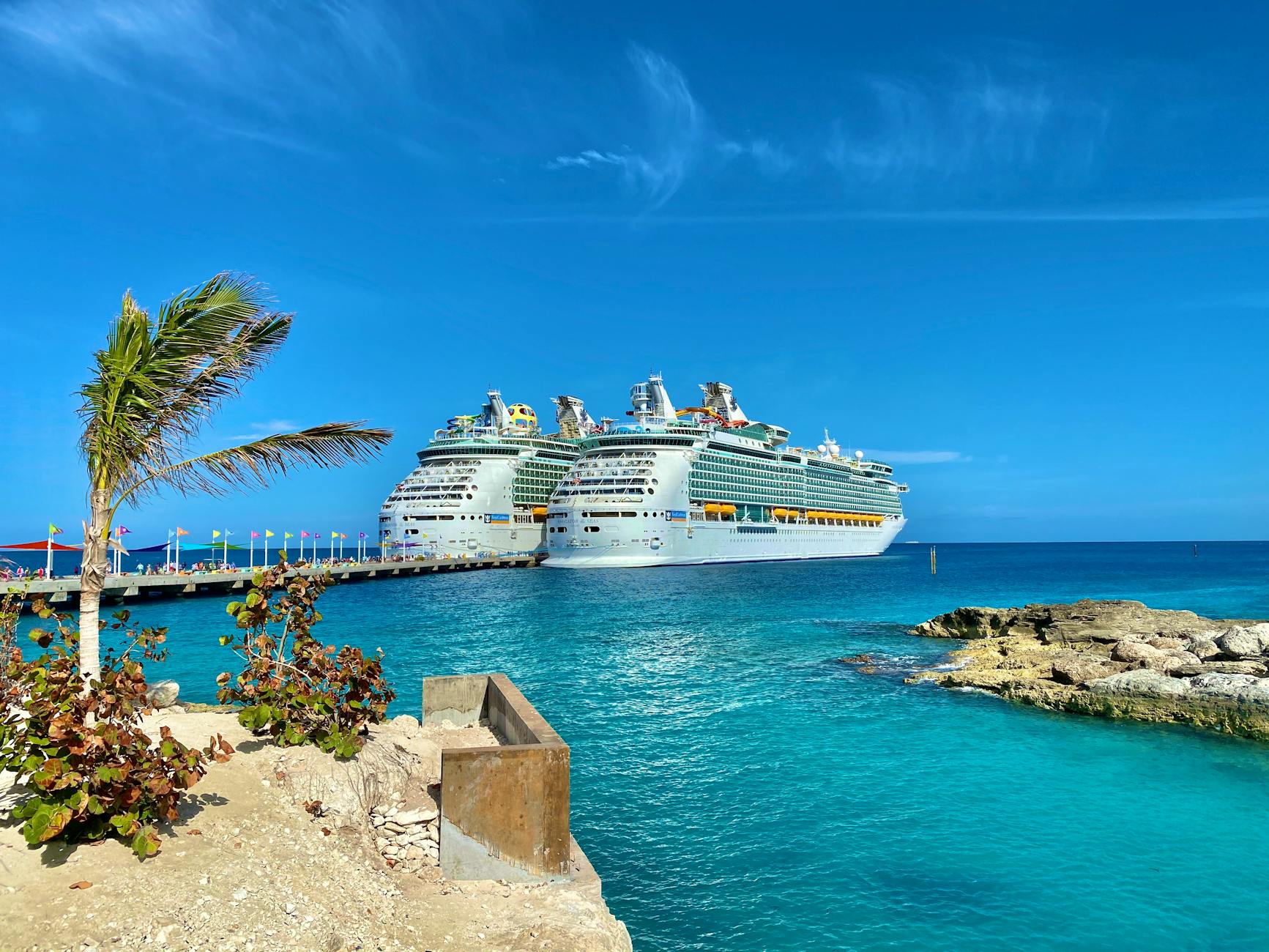 luxury liners sailing on bright ocean near city port