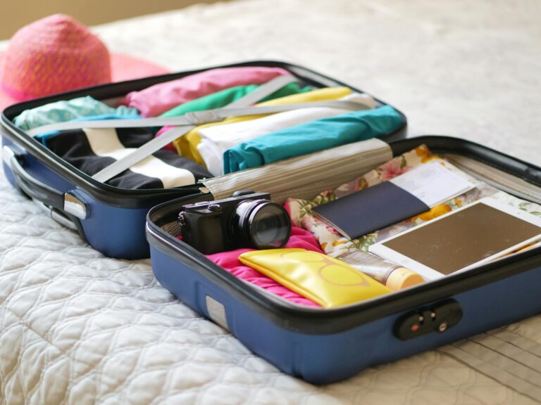 clothes and assorted things in a suitcase