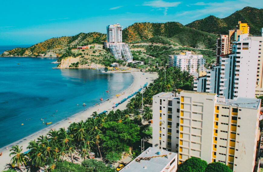 A breathtaking aerial view of Santa Marta's beachfront, showcasing a blend of nature and modern architecture.